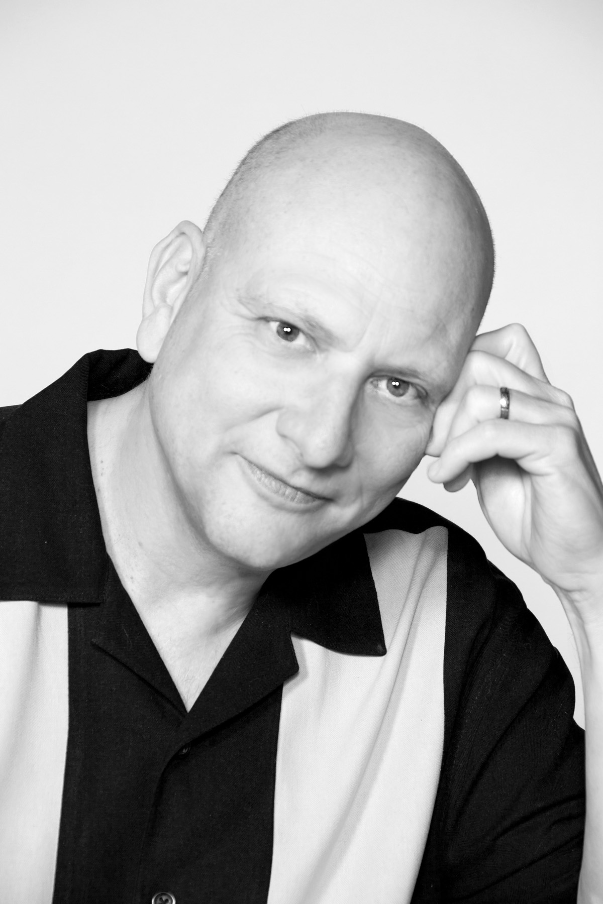 Black and white portrait of Fish Fry host Chuck Haddix