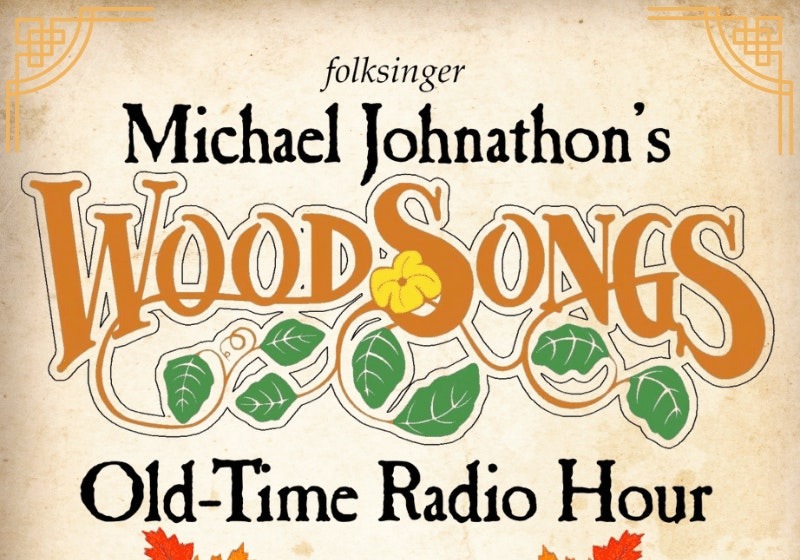 WoodSongs Old-Time Radio Hour logo with folksinger Michael Johnathon's name